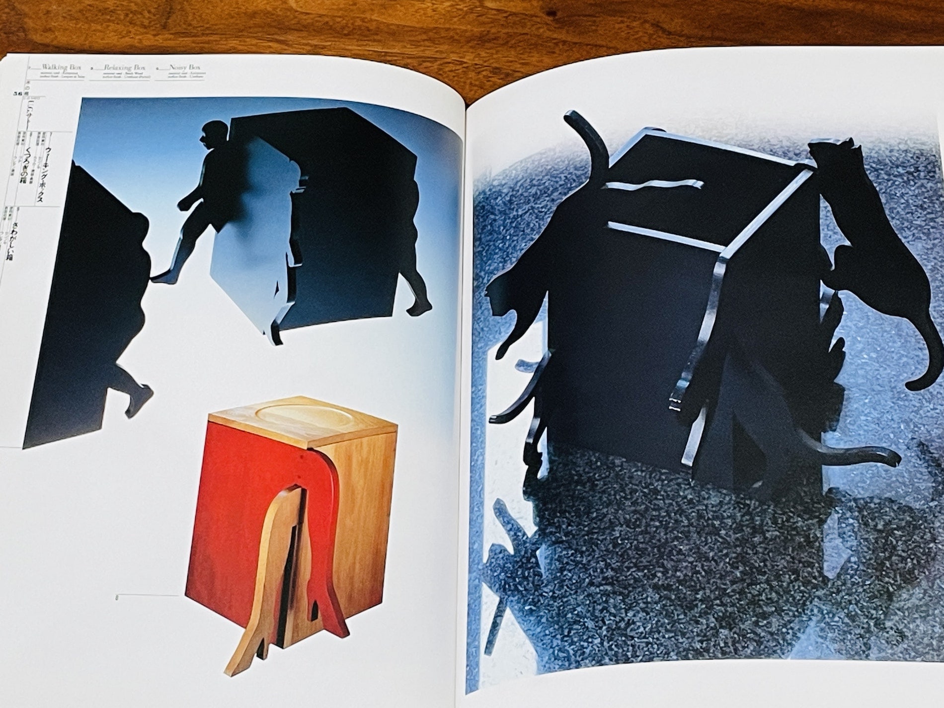 black and red/maple ornate figurine boxes in the shame of silhouettes, body parts, and jumping cats; from Wood Package book, by Keiko Hirohashi