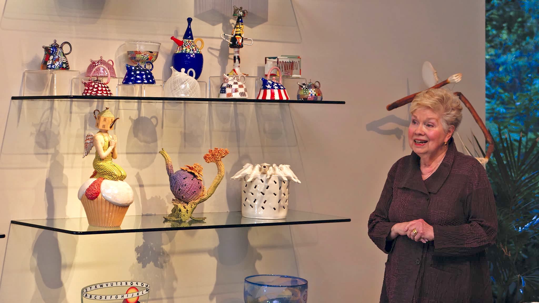 Gloria Kamm with her teapot collection in her home, Denise Kang Photo, Craft in America