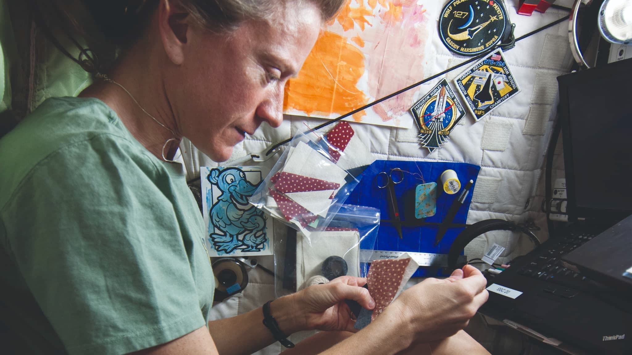 Karen Nyberg sewing on the International Space Station, Craft in America
